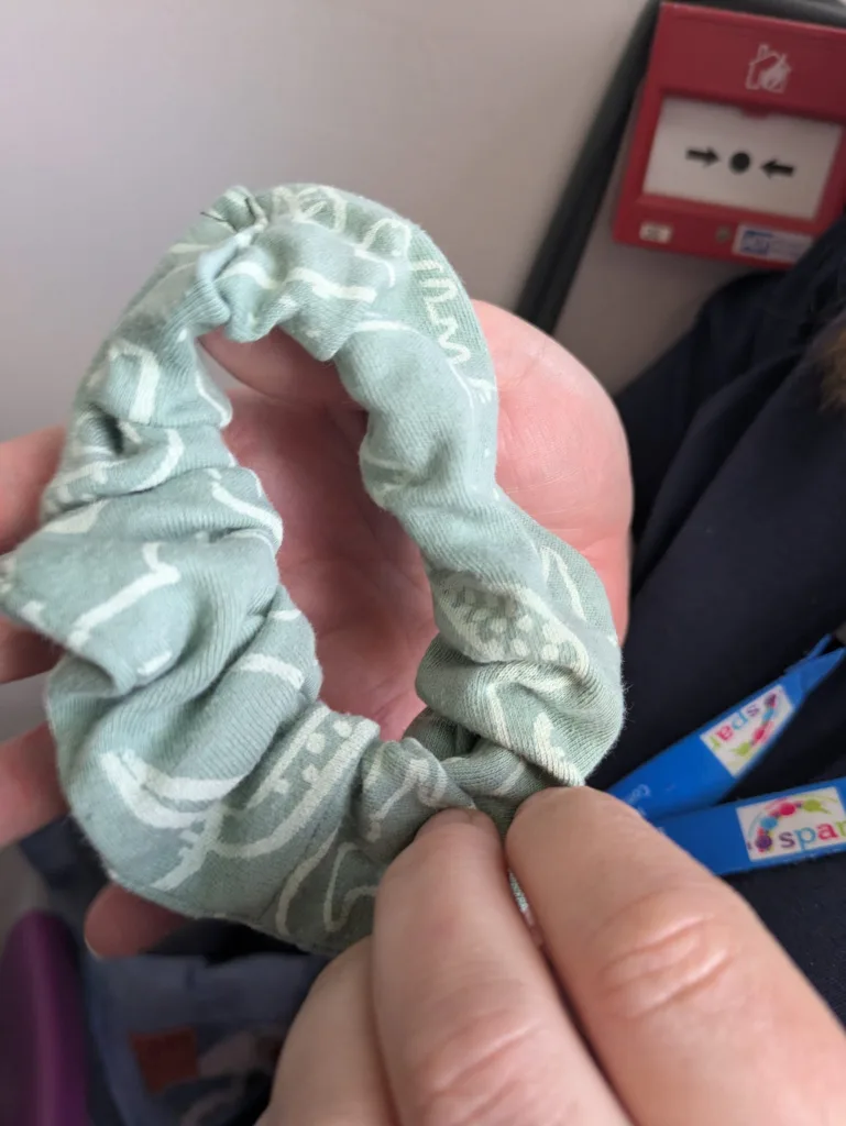 A photo of a scrunchie hair tie made out of fabric