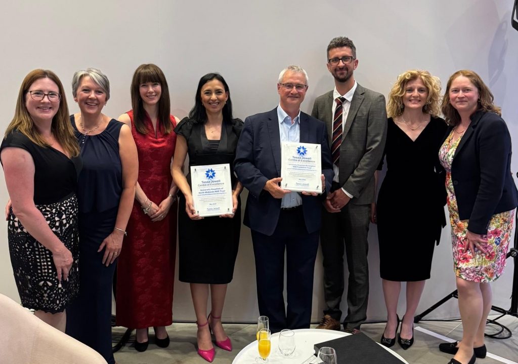 Colleagues posing with the award at the recent ceremony