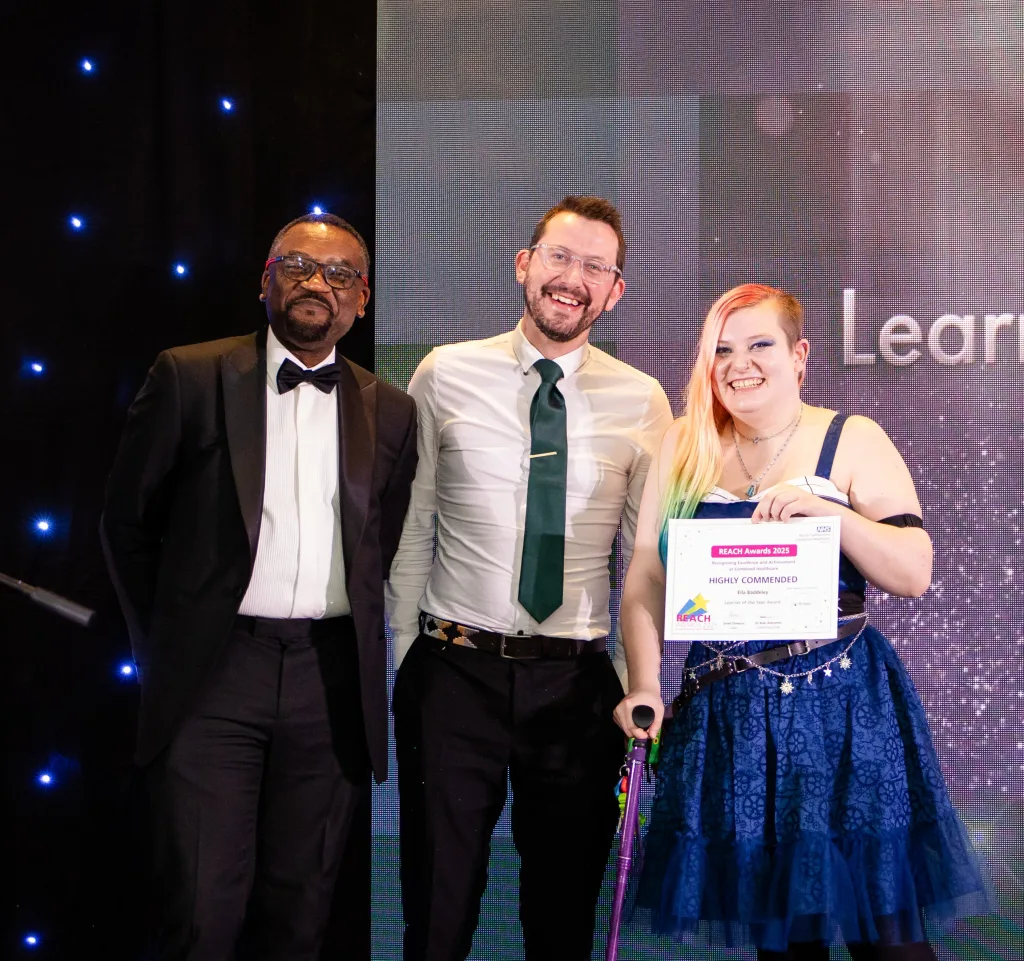 Ella accepts her award