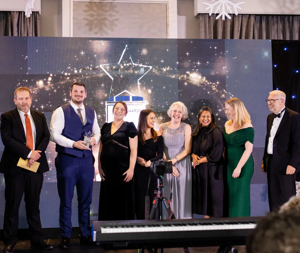 The team accept their award