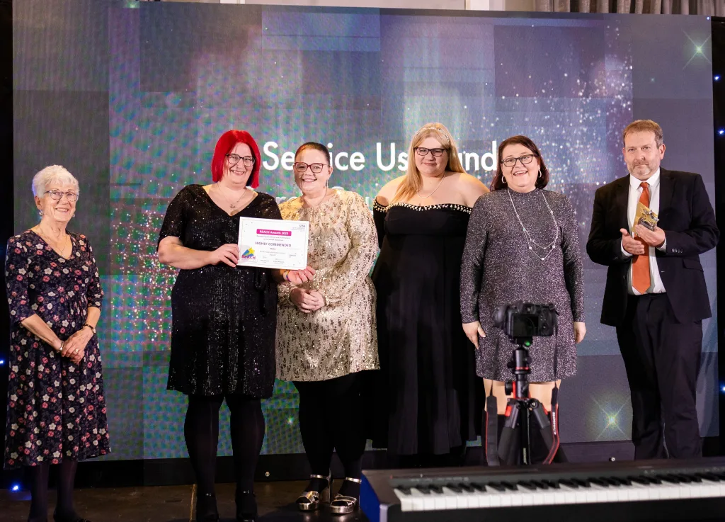 PEGiS accept their award