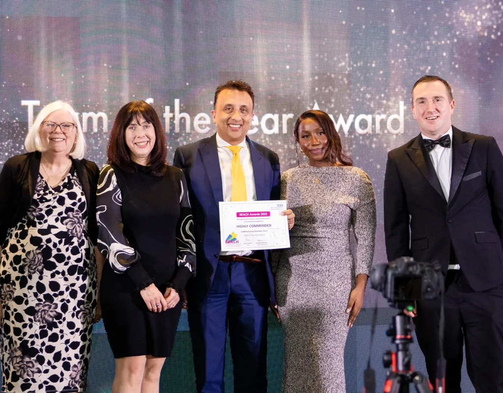 The team accept their award