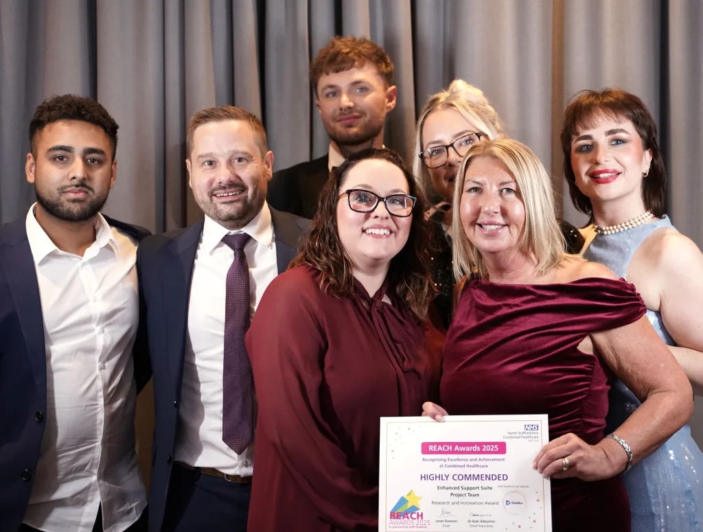 The team pose with their award
