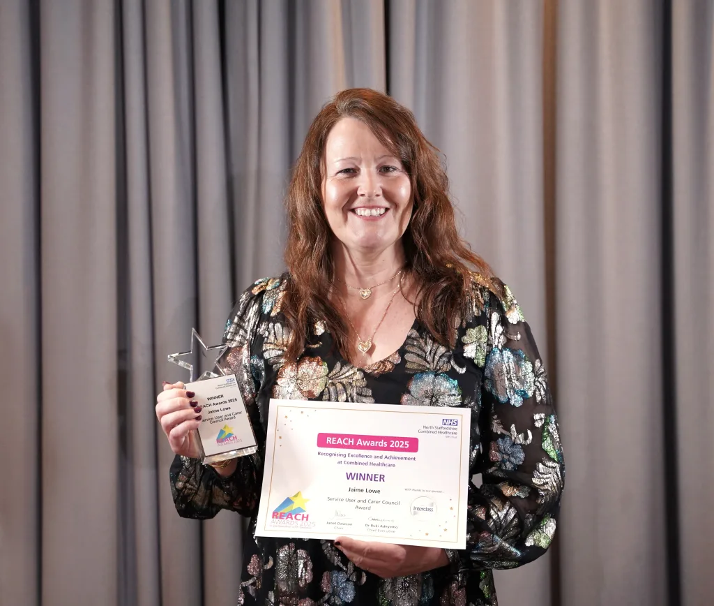 Jaime poses with her award