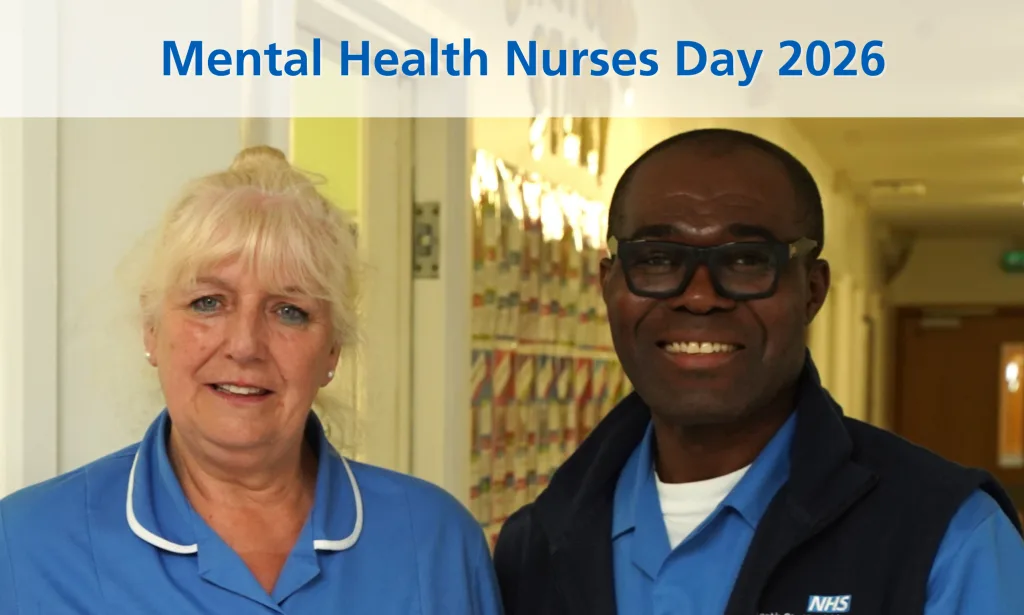 Two nurses standing together in uniform underneath a banner saying 'Mental Health Nurses Day 2026'