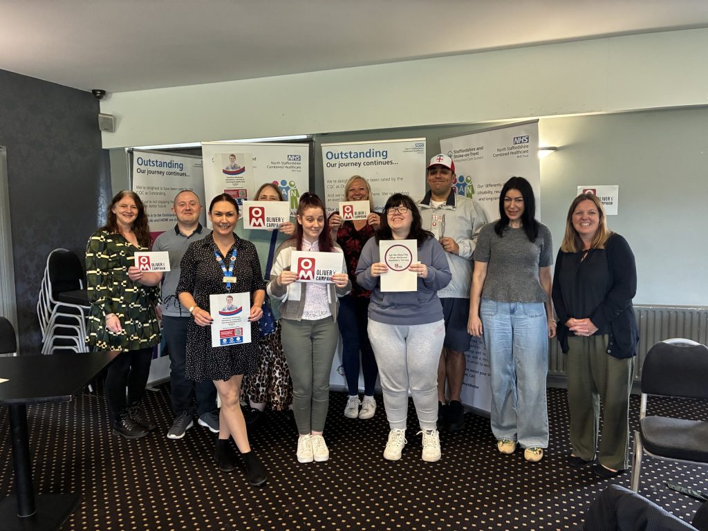 Colleagues pose for a photo at the Oliver McGowan training recruitment day